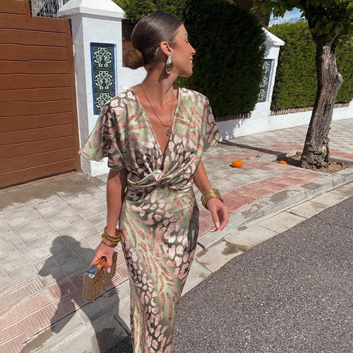 Kayla – Long dress with V-neckline and twisted detail