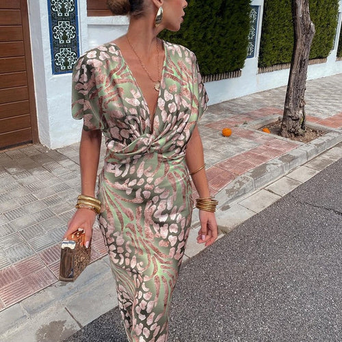 Kayla – Long dress with V-neckline and twisted detail