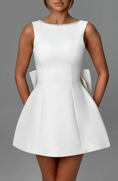 Charlotte - Elegant Pearl Bow Mini Dress