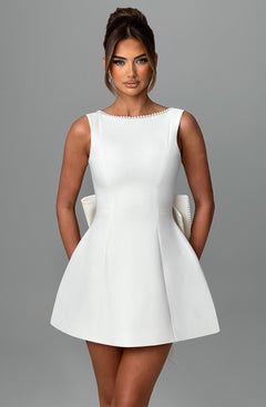 Charlotte - Elegant Pearl Bow Mini Dress