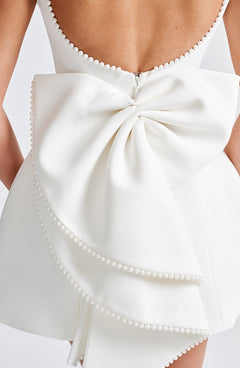 Charlotte - Elegant Pearl Bow Mini Dress