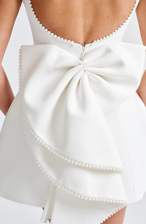Charlotte - Elegant Pearl Bow Mini Dress